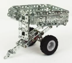 Tronico Micro New Holland T5-115 Met Aanhanger – Schaal 1 : 64 -Kinderwereld Verkoop tractor new holland t5 115 tronico micro 9560 3